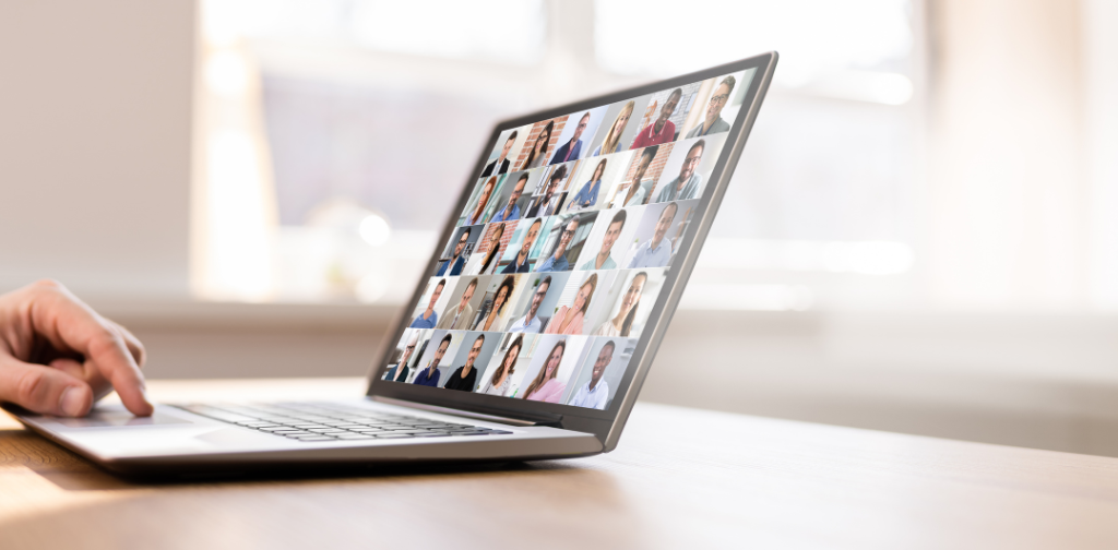 A laptop with many people on a video chat call