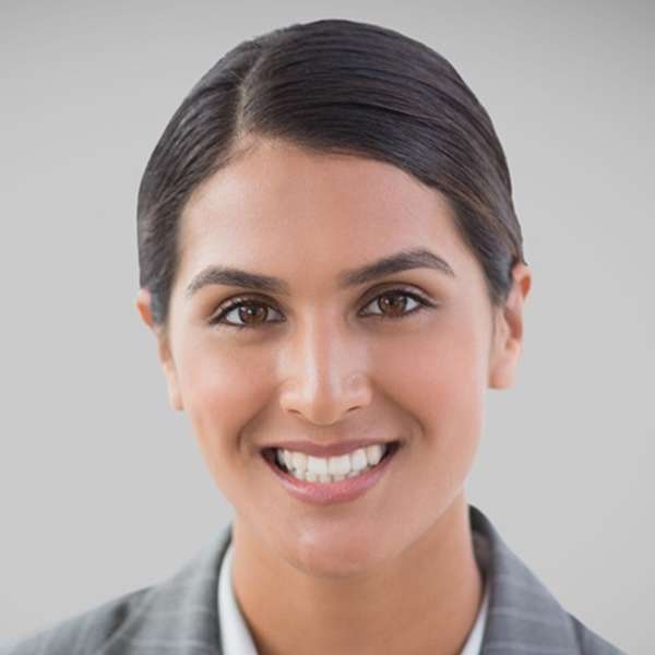 Professional headshot of a smiling woman