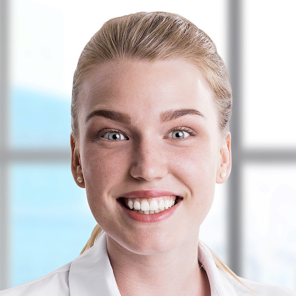 Professional headshot of a young woman