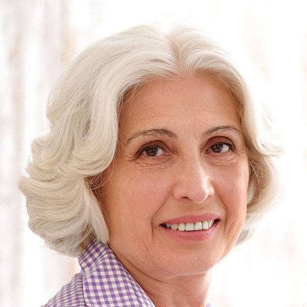 Headshot of a smiling older woman
