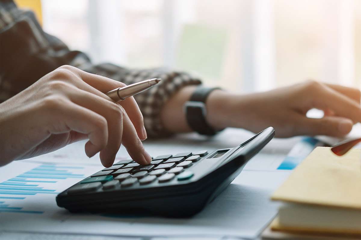 A Person Making a Calculation