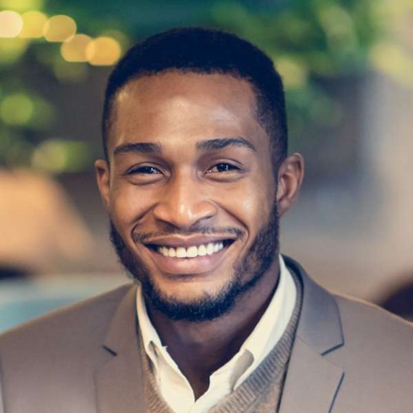 Headshot of a man in a suit