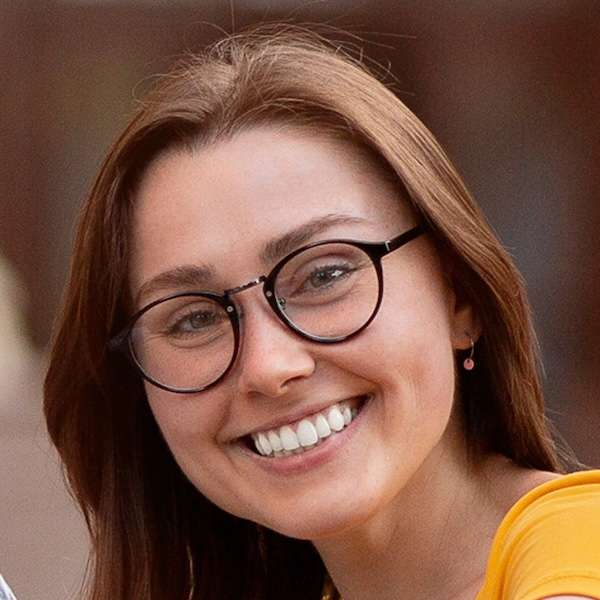 Headshot of a woman with glasses