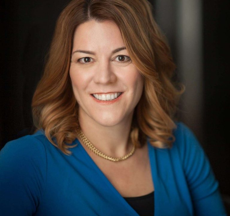 Headshot of Karin Hurt smiling