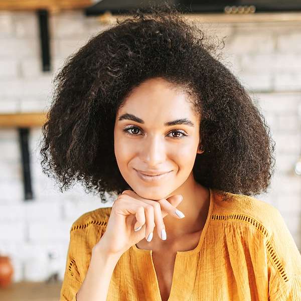 Professional headshot of a smiling woman