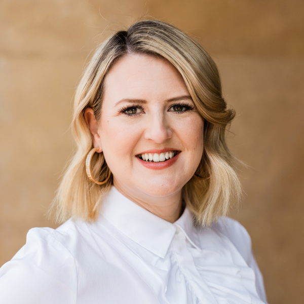 Professional headshot of a woman smiling