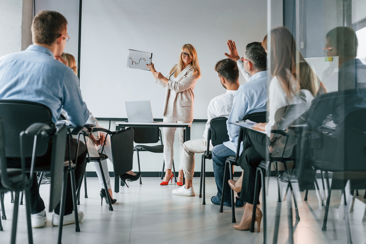 A woman delivering engaging training to professionals