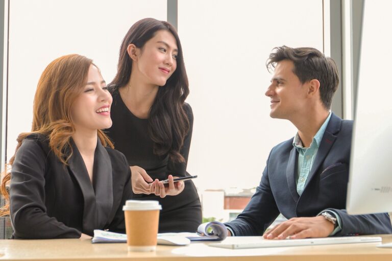 Coworkers talking to each other