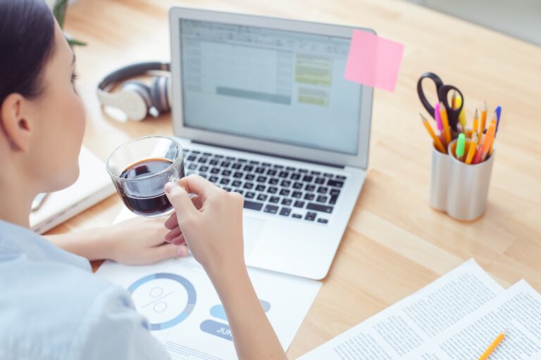 A woman working on her computer