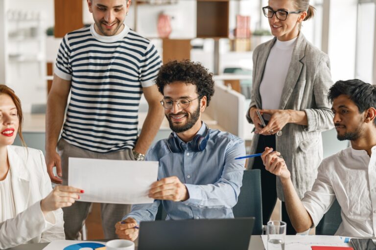 A diverse group of coworkers working together