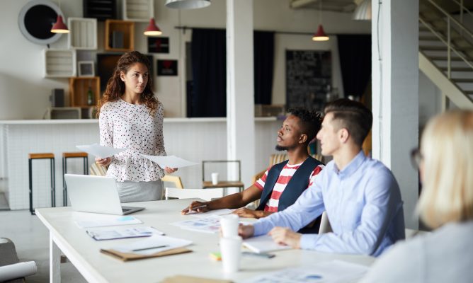 A woman leading a business meeting