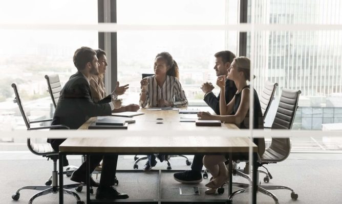 Coworkers communicating change