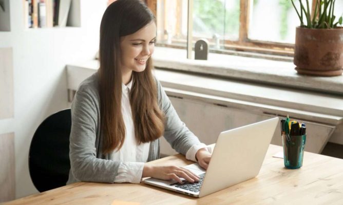 A girl working on her laptop