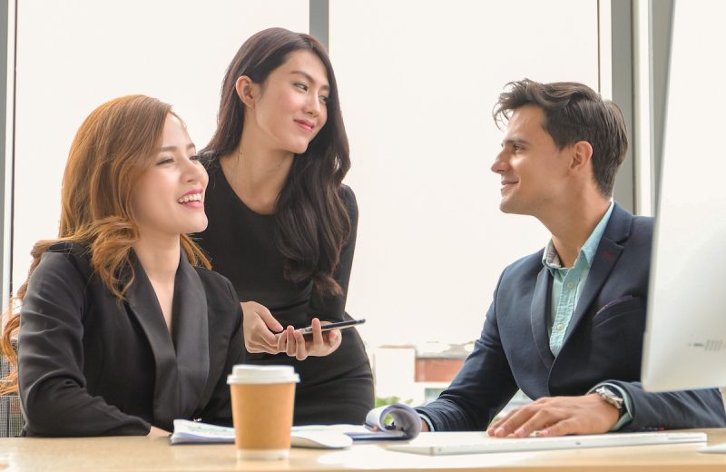 Coworkers talking to each other