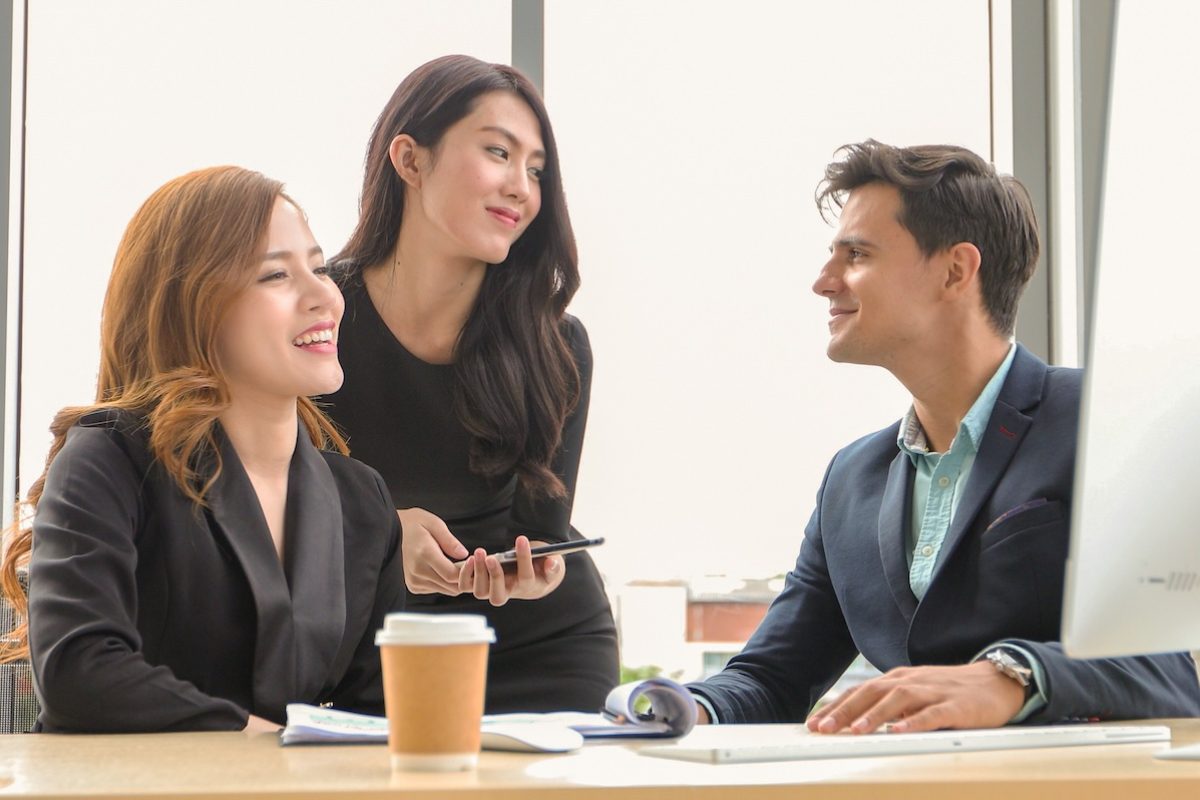 Coworkers talking to each other