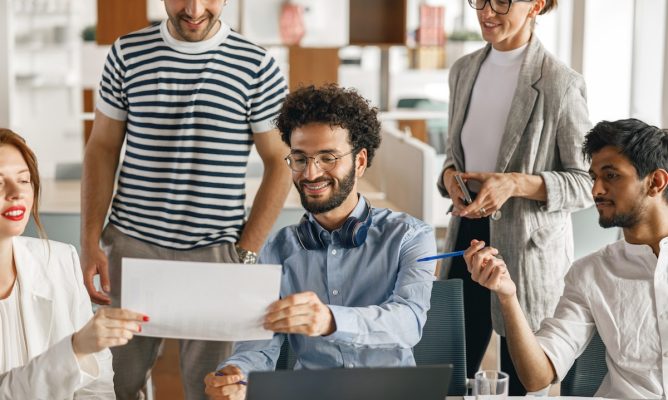 A diverse group of coworkers working together