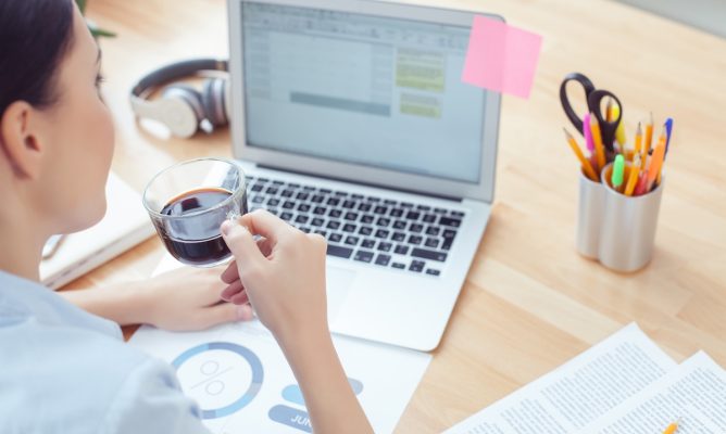 A woman working on her computer
