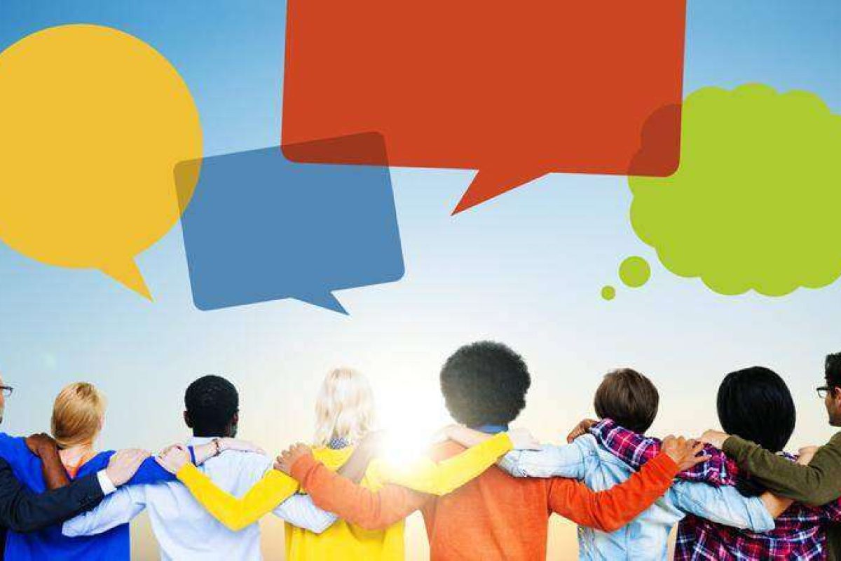 people standing together facing blank speech bubbles