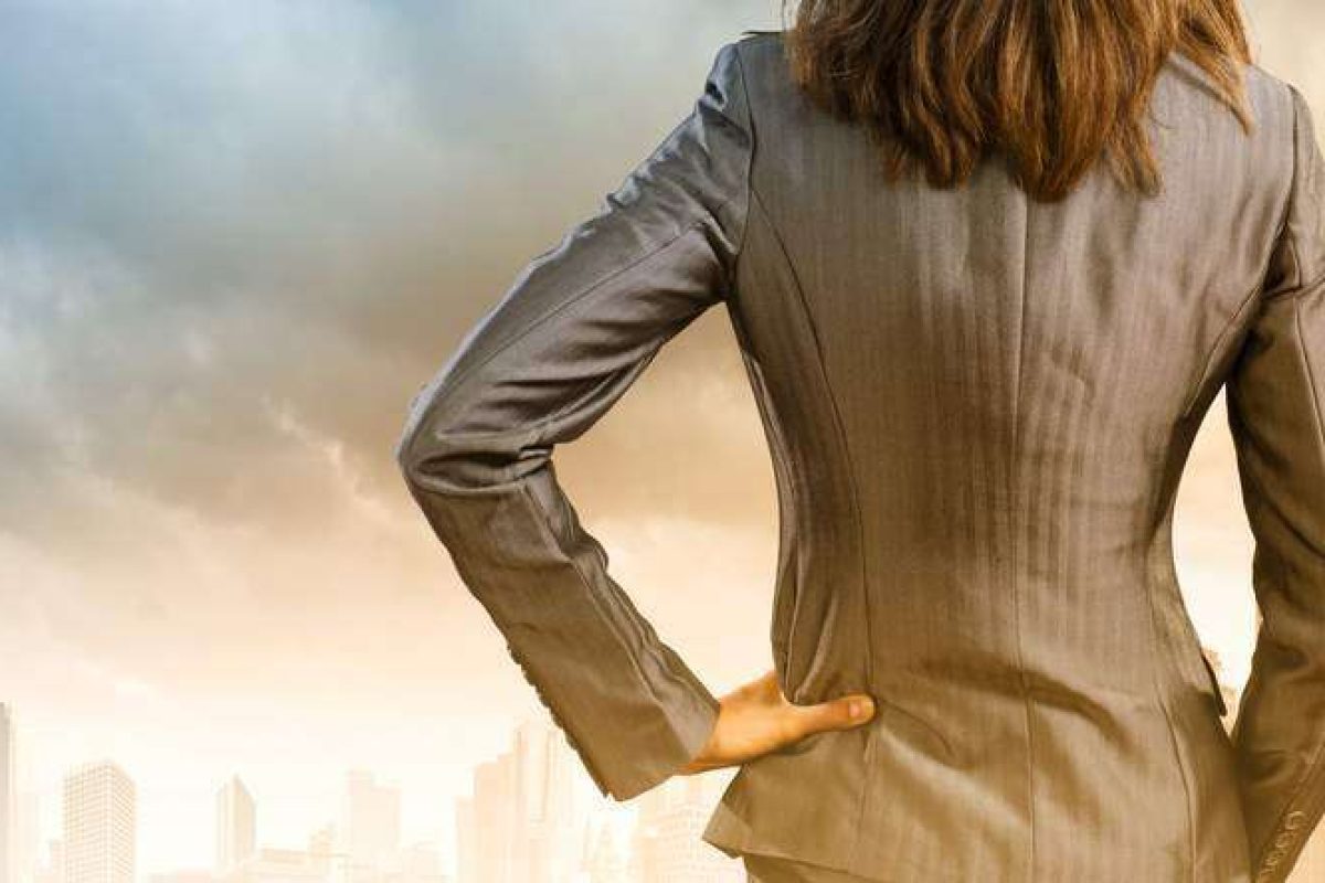 A female leader looking at the city