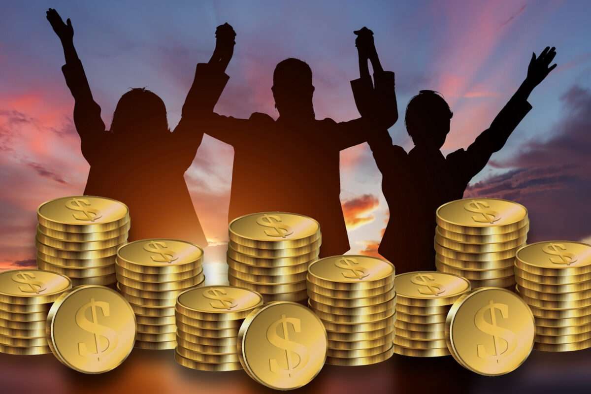 Outline of people behind stacks of coins